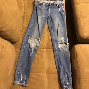 Low dark blue ripped jeans